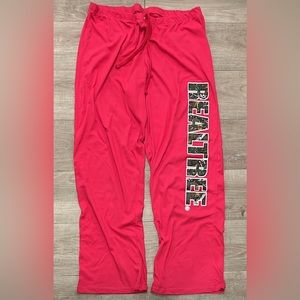 Pink lounge pants, never worn, without tags.